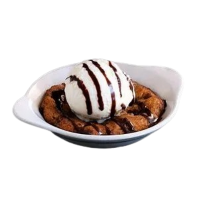 Chocolate chip cookie dough dessert with vanilla ice cream and chocolate drizzle at Pizza Hut Buffet.